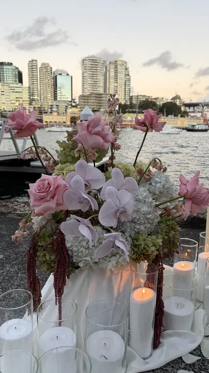 Pastel floral centrepiece with harbour view