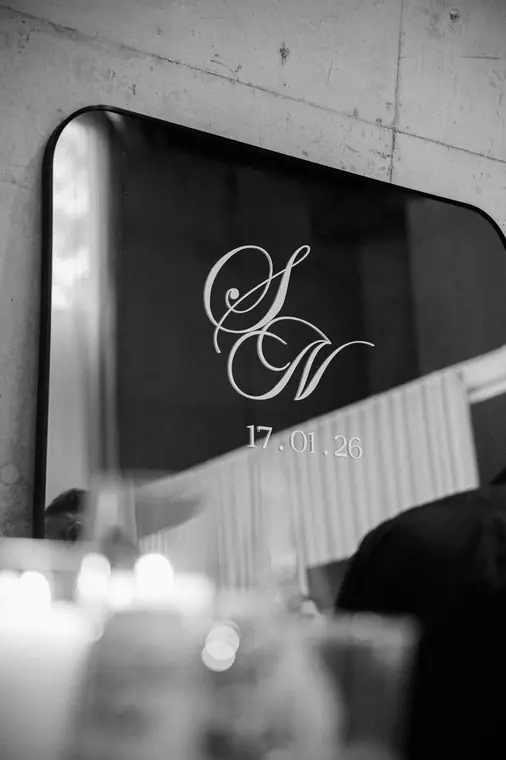 S and N monogram mirror signage